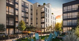 Modern multi-story residential buildings surrounding a courtyard with blue Adirondack chairs, landscaping, and trees at sunset.